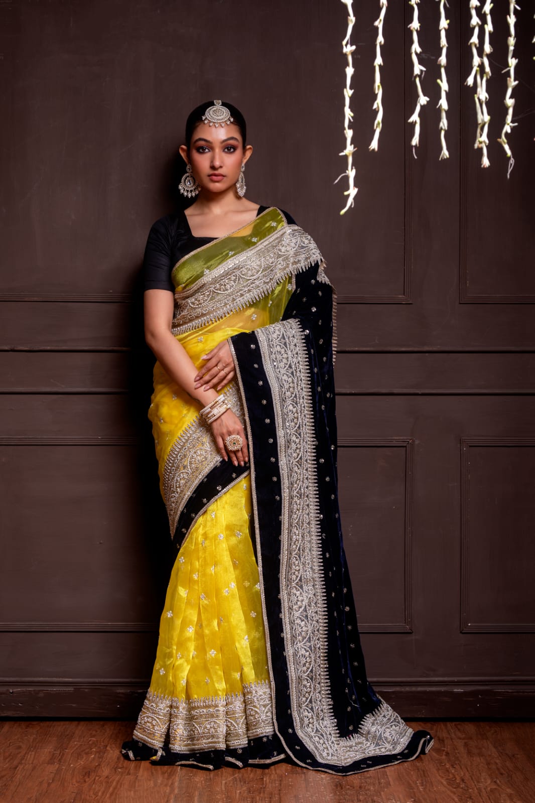 Artisanal Yellow Handwoven Saree with Luxurious Black Velvet Border and Intricate Silver Hand Embroidery