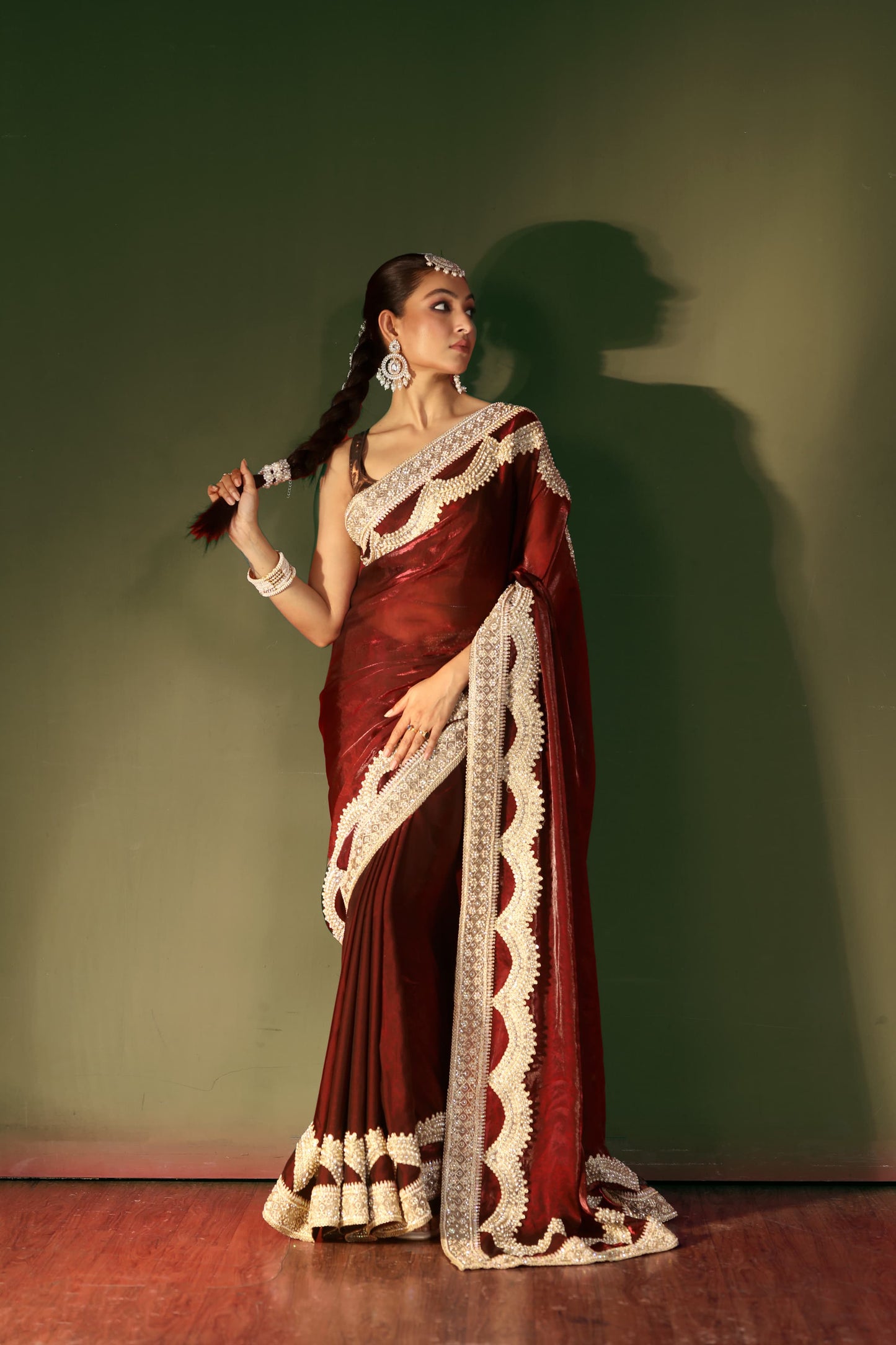 Regal Maroon Velvet Saree with Intricate Handcrafted Zari Embroidery