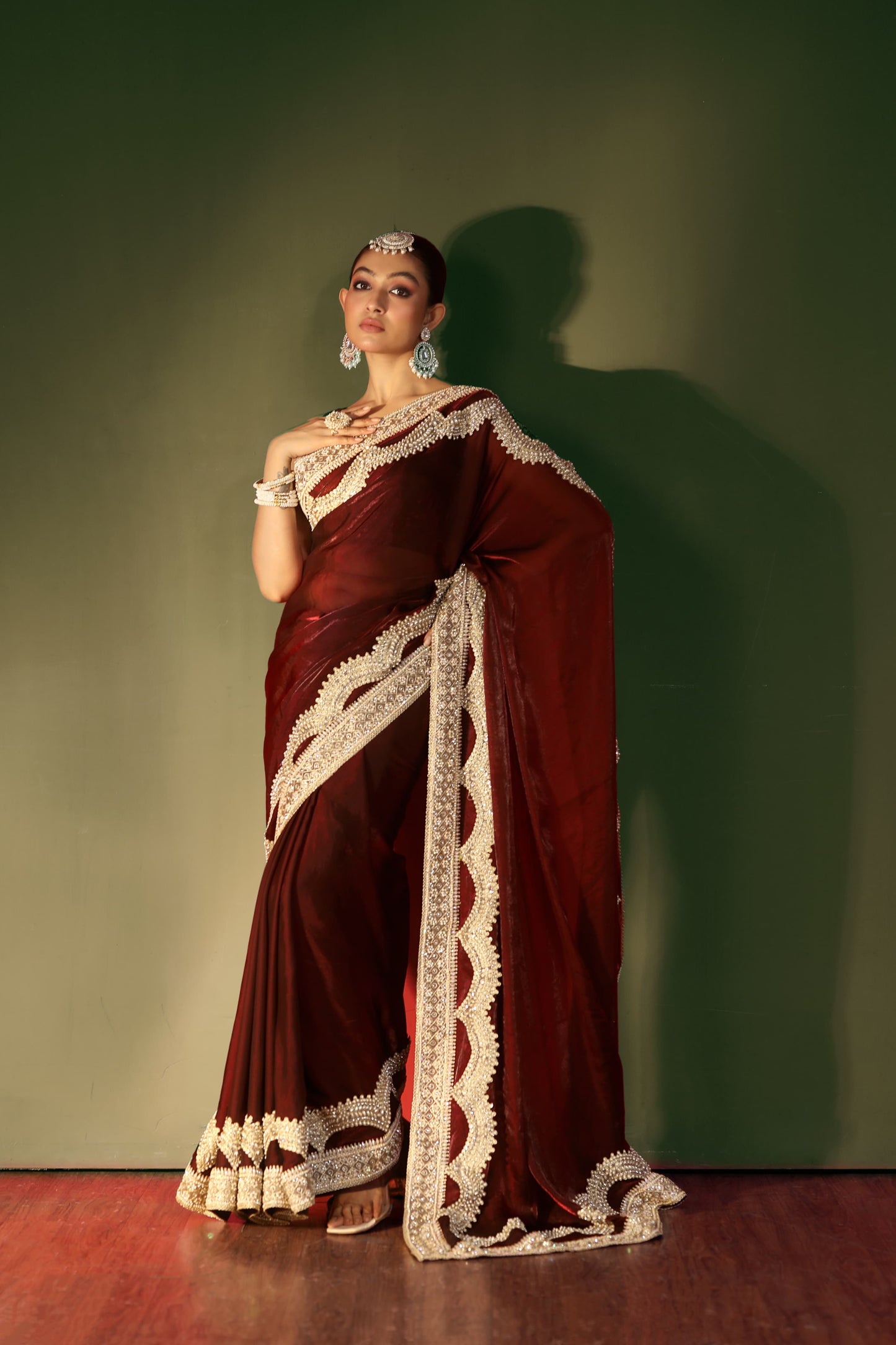 Regal Maroon Velvet Saree with Intricate Handcrafted Zari Embroidery