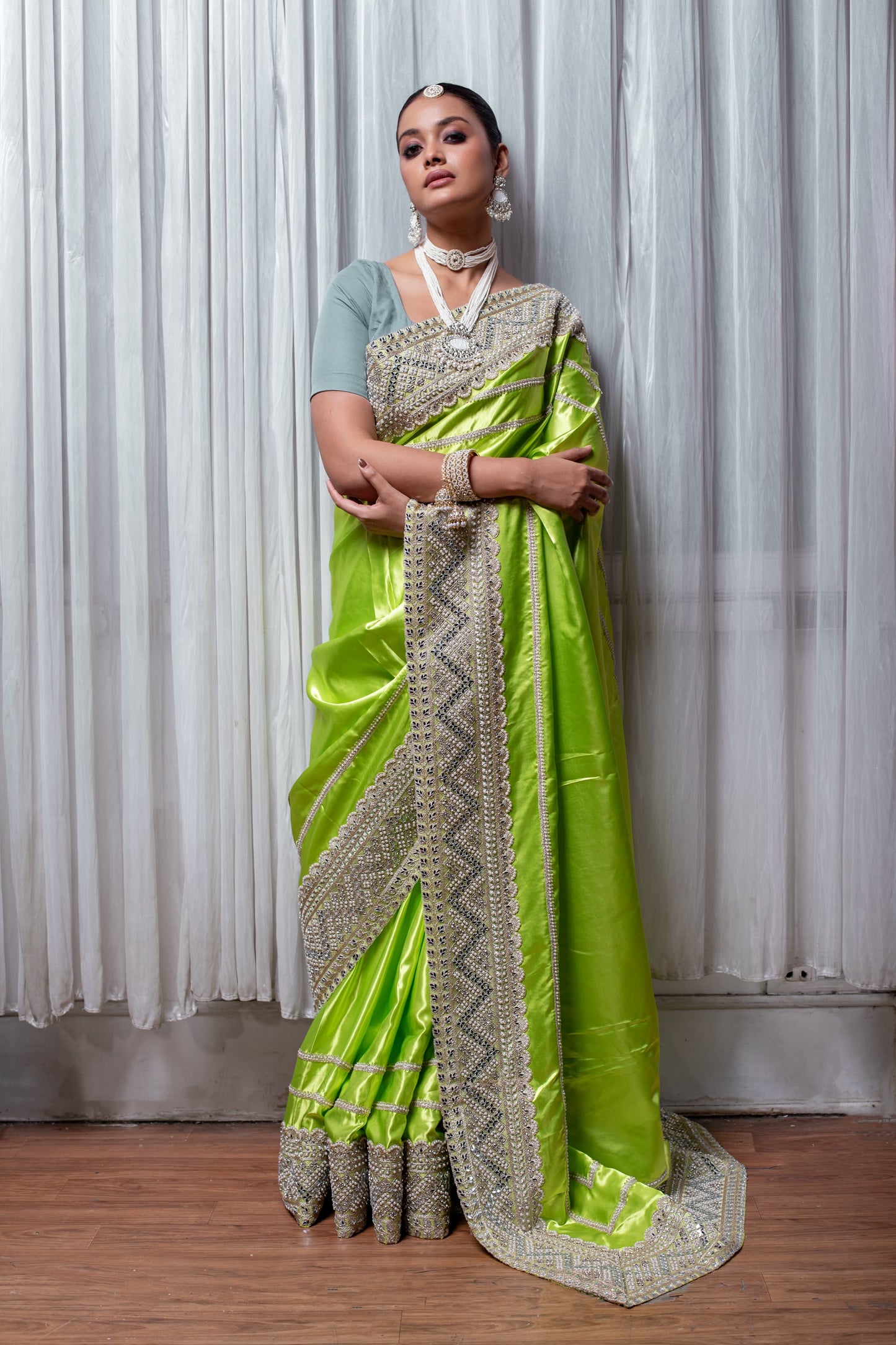 Luminous Lime Green Handcrafted Silk Saree with Intricate Embellishments