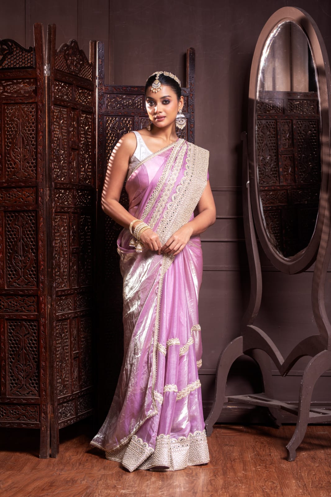 Blush Pink Handwoven Silk Saree with Lavish Handcrafted Embellishments and Glistening Golden Borders