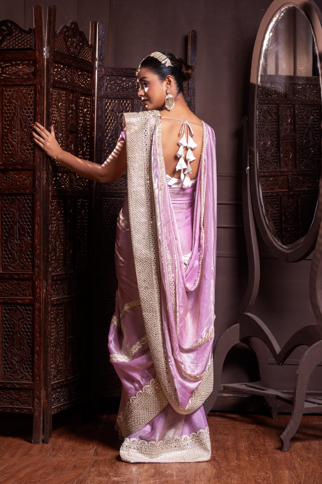 Blush Pink Handwoven Silk Saree with Lavish Handcrafted Embellishments and Glistening Golden Borders
