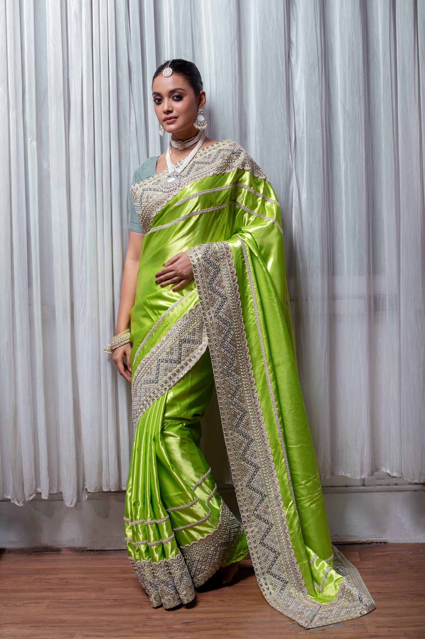 Luminous Lime Green Handcrafted Silk Saree with Intricate Embellishments