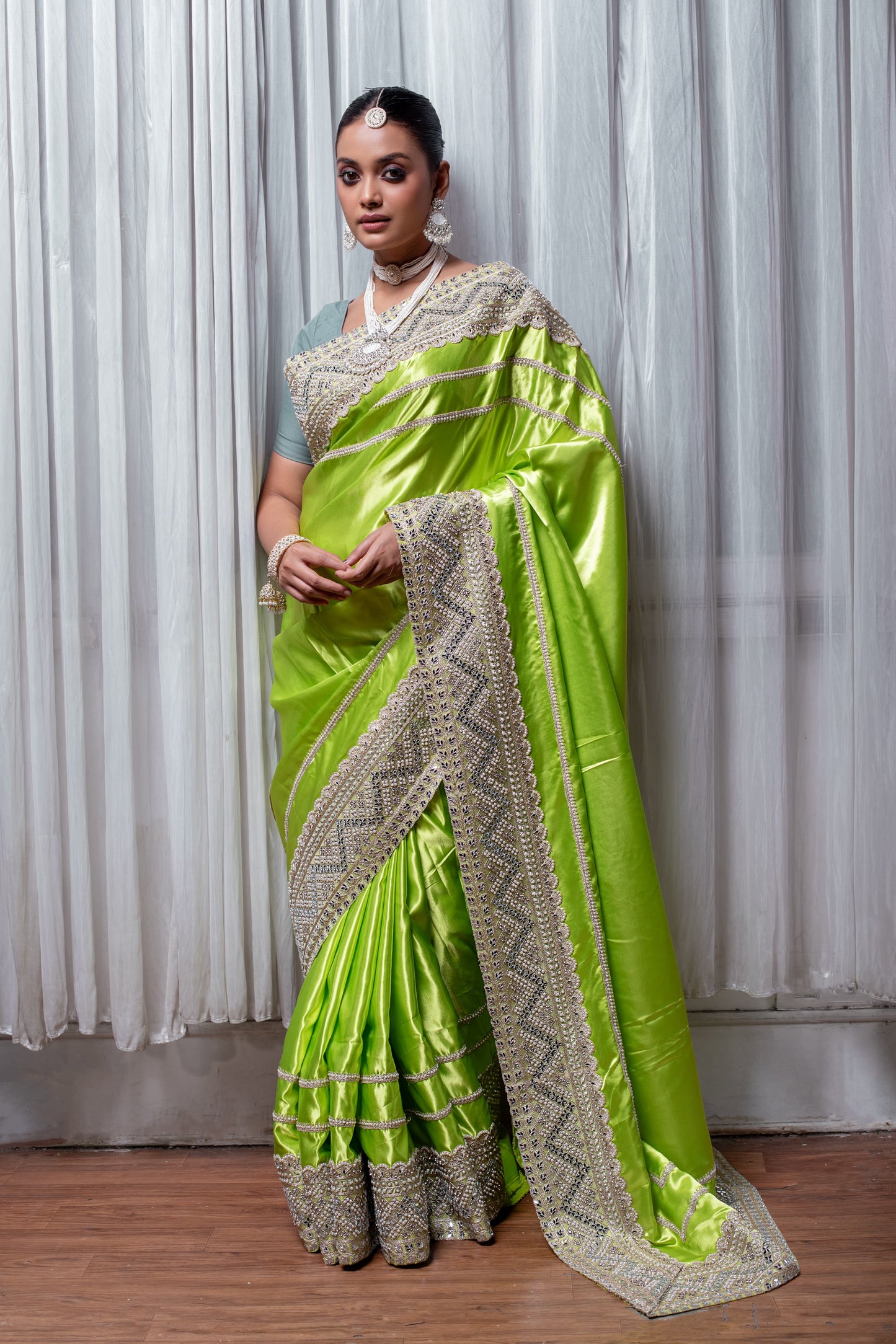 Luminous Lime Green Handcrafted Silk Saree with Intricate Embellishments
