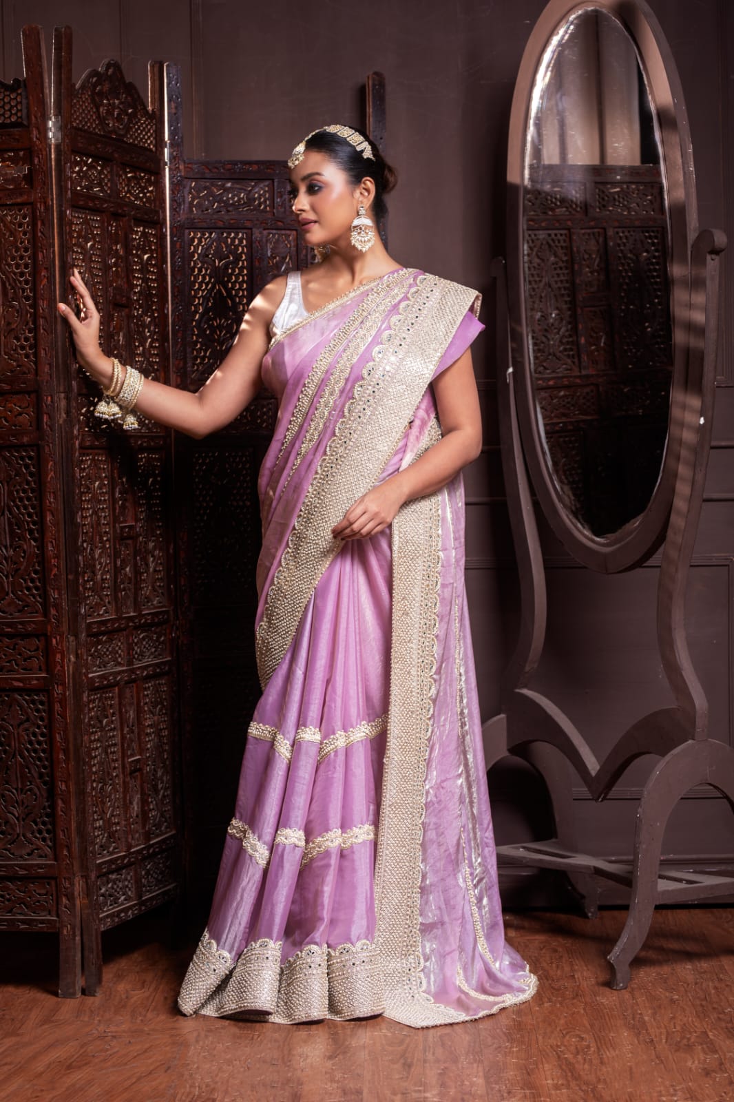 Blush Pink Handwoven Silk Saree with Lavish Handcrafted Embellishments and Glistening Golden Borders