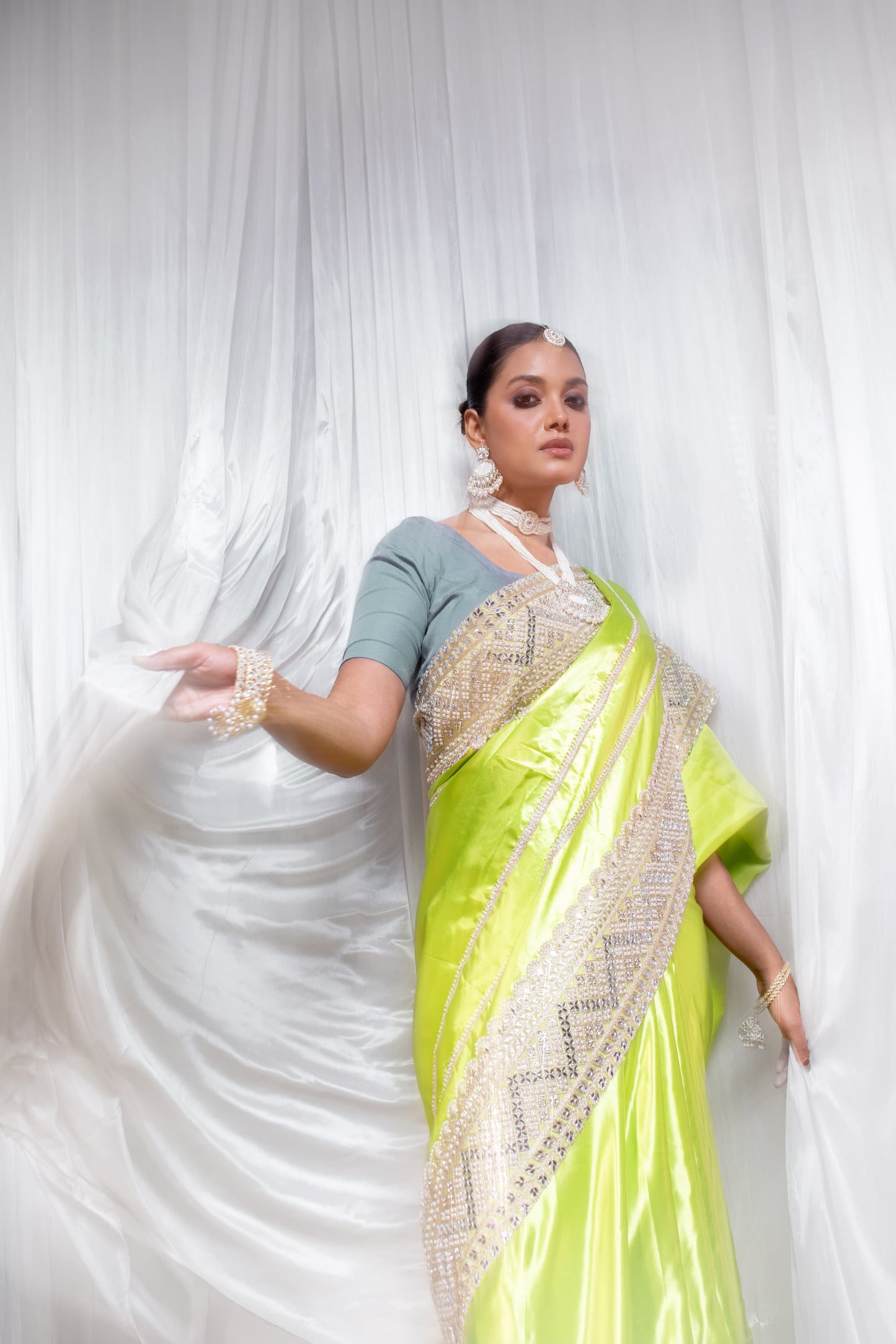 Luminous Lime Green Handcrafted Silk Saree with Intricate Embellishments